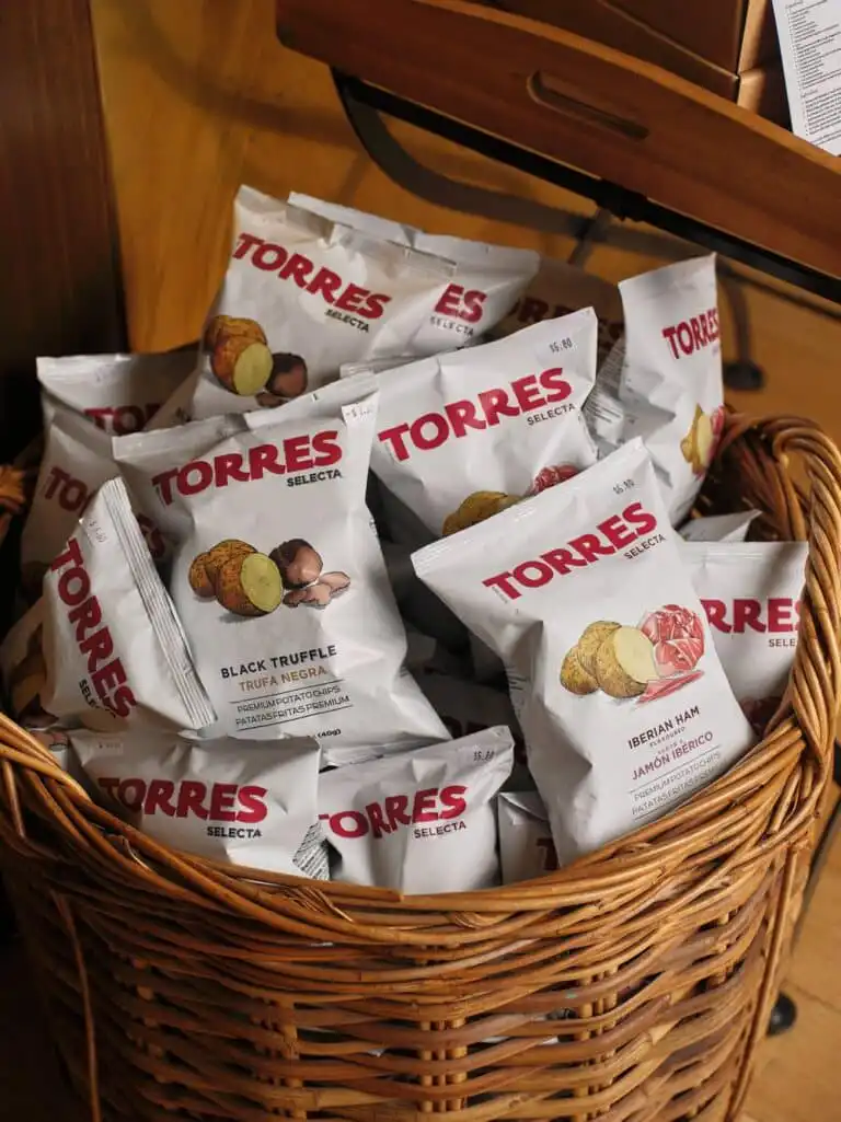 Basket of Torres truffle and Iberian ham crisps in the providore